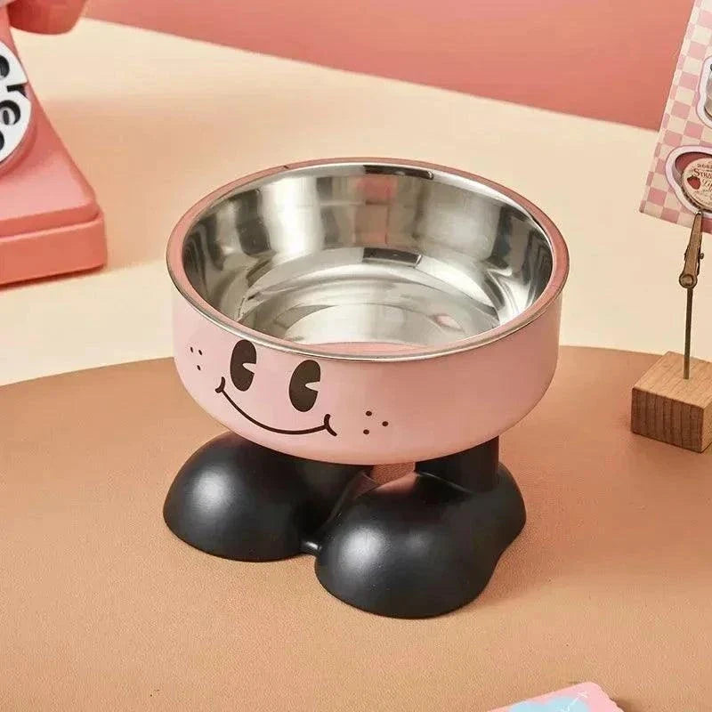 Stainless steel elevated dog bowl with non-slip base and smiling face design