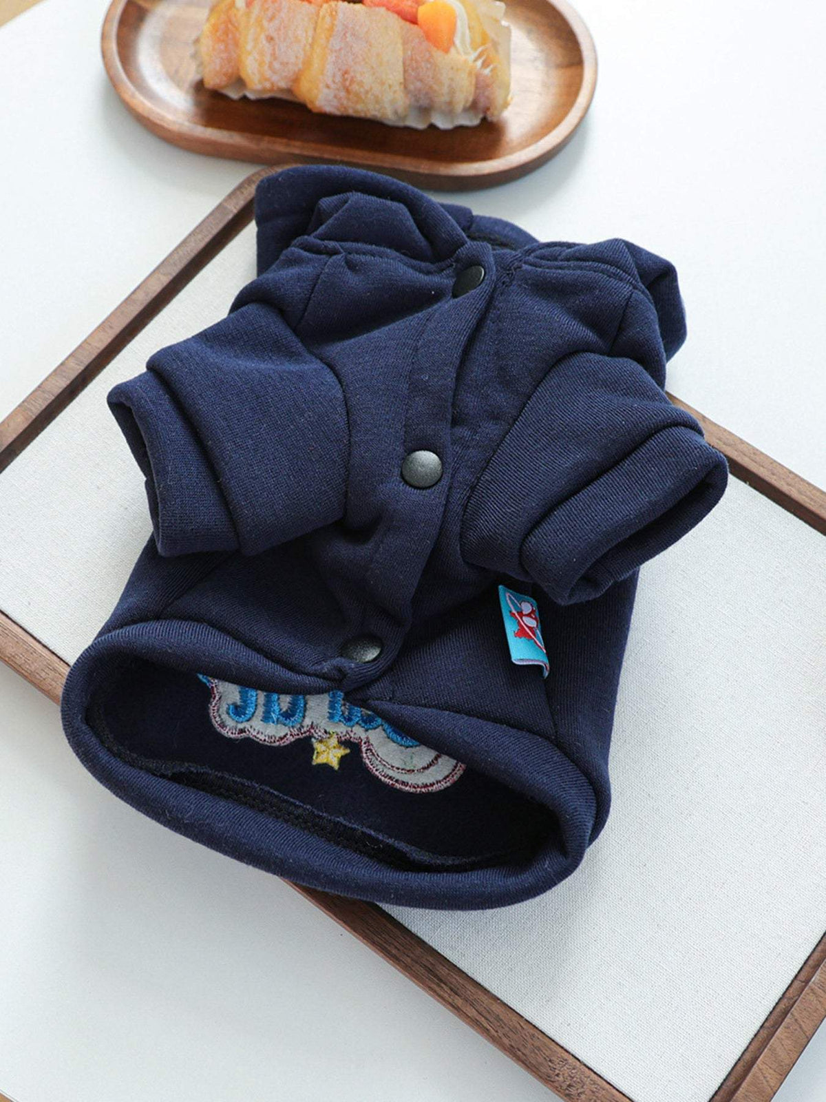Cozy embroidered pet hoodie with detailed stitching