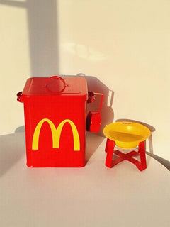 Red airtight pet food storage container with scoop and yellow logo