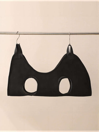 Breathable pet shower hammock securing dog during bath