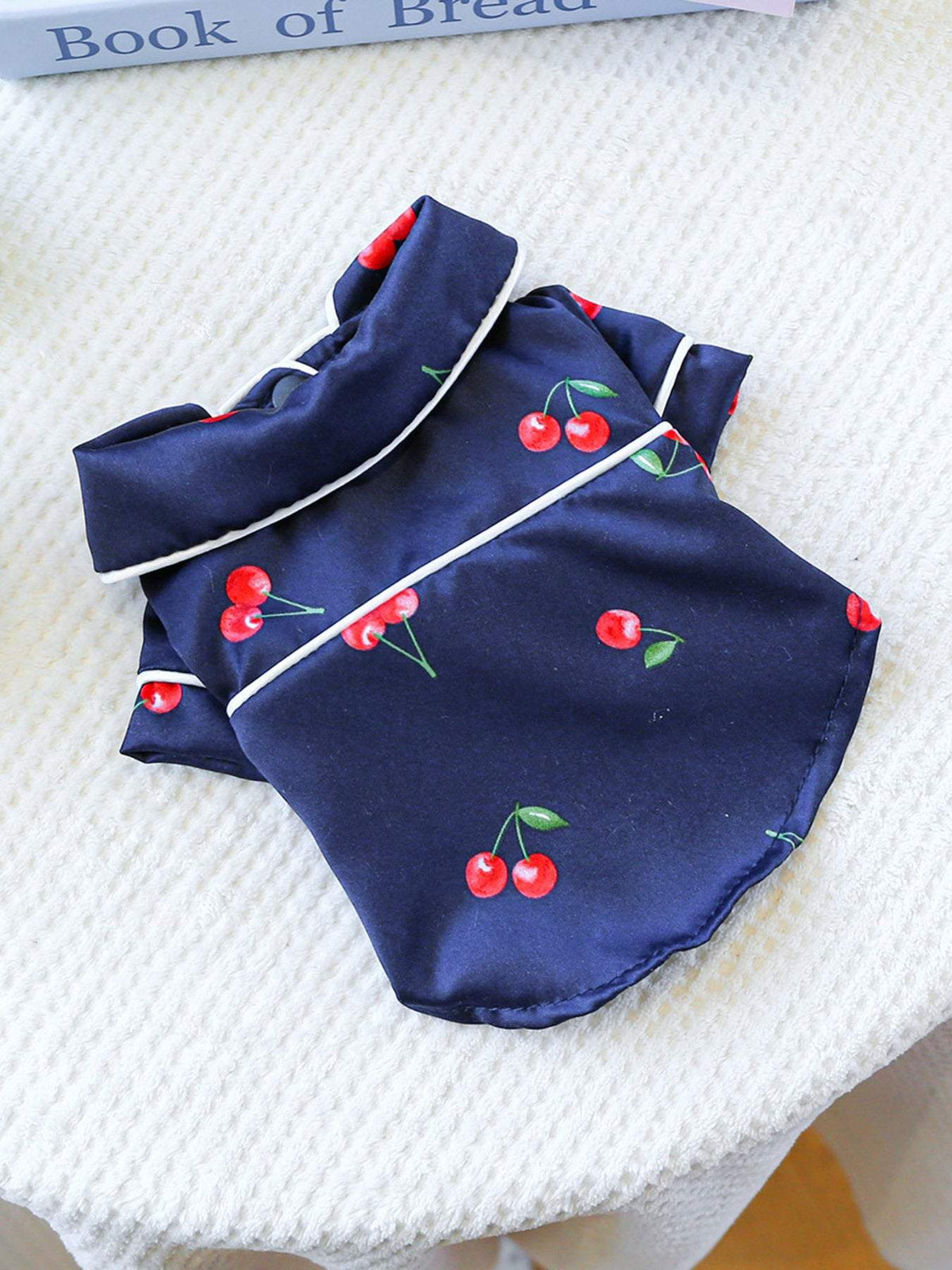 pet wearing soft satin pajamas with contrast piping